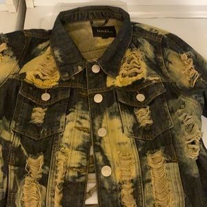Women’s distressed button up denim jacket